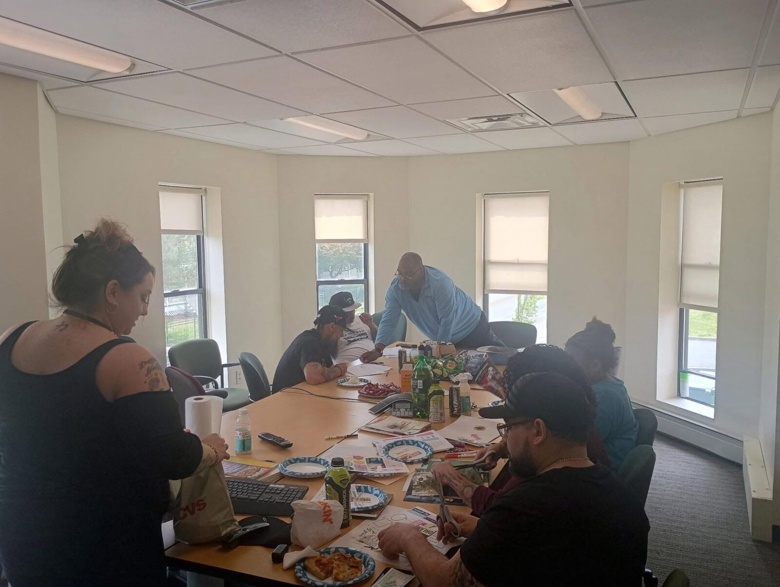 SCRIP participants and team members meeting in a small group