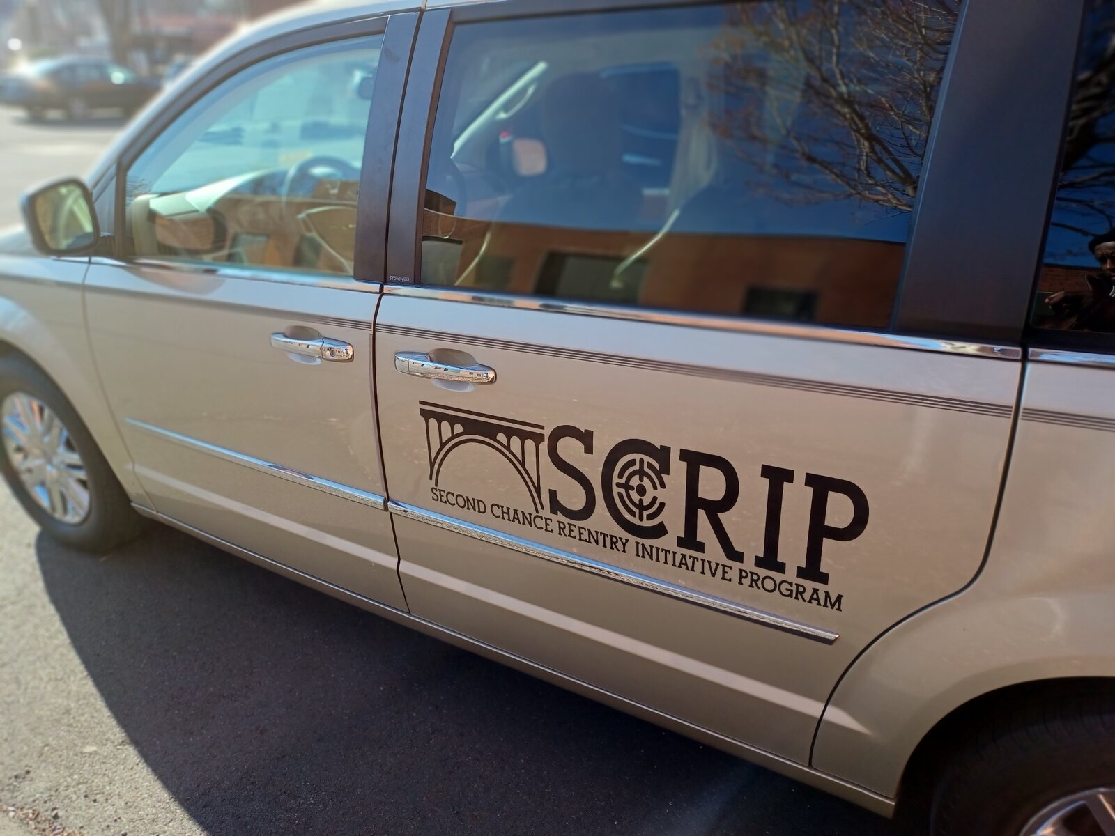 SCRIP company van used for community outreach and support