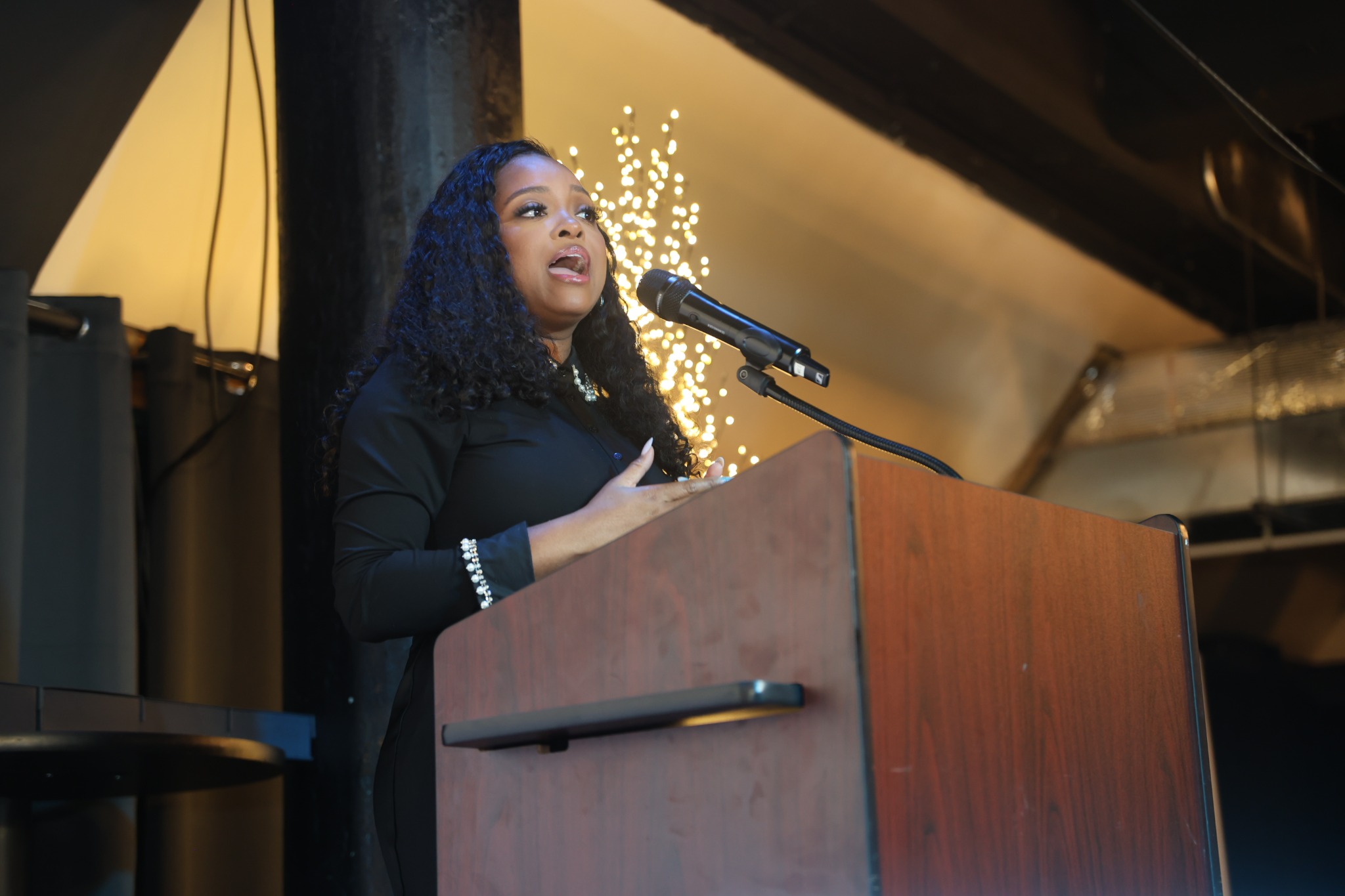 Tamika D. Mallory speaking at SCRIP's fundraising gala