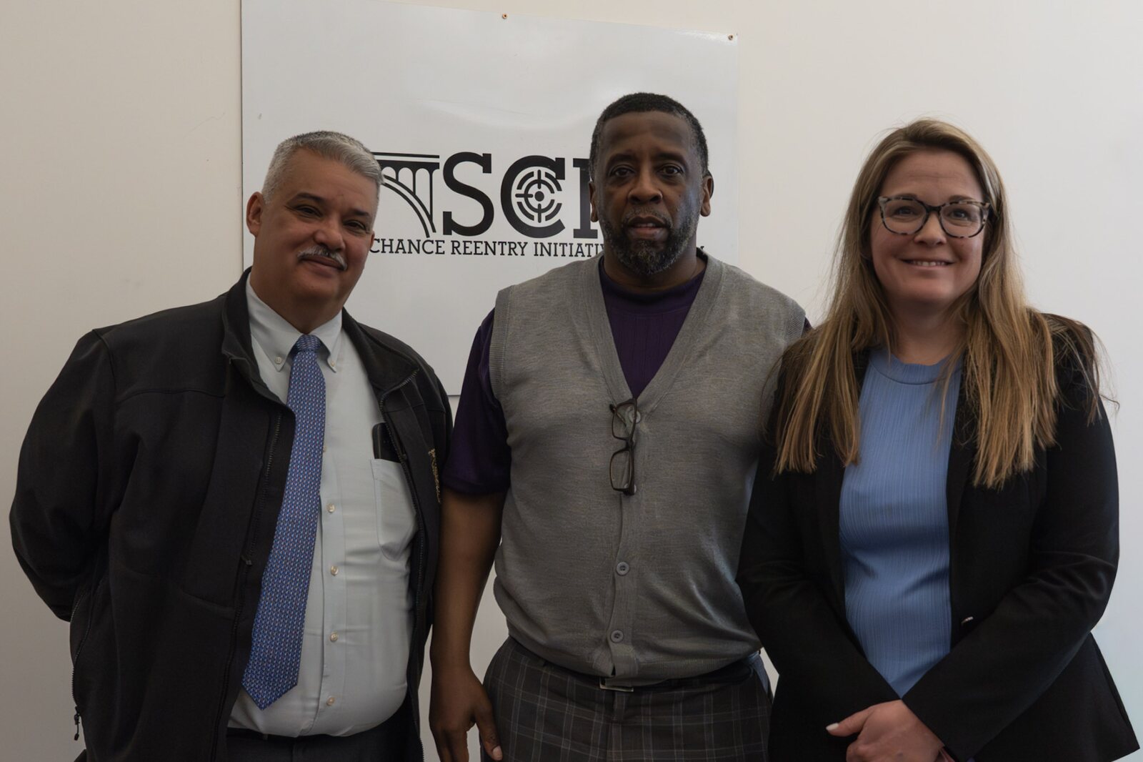 Edward Andrews with Deputy Chief State's Attorney Lisa M. D'Angelo and a justice-system leader