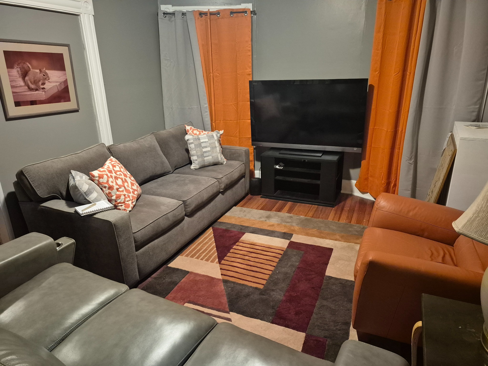 A furnished living room representing housing stability after reentry